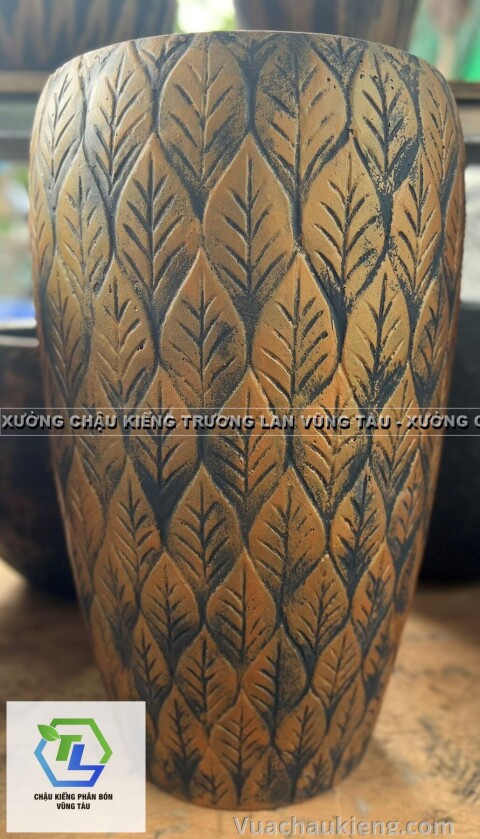 Chậu xi măng tròn hoa văn lá